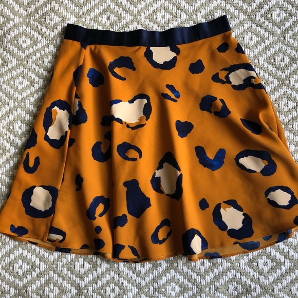orange and blue leopard print skirt